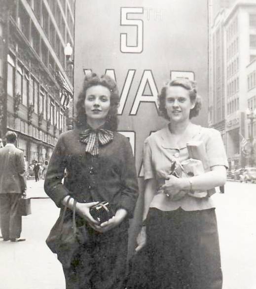 PHOTO - CHICAGO - STATE STREET - TWO WOMEN IN FRONT OF WAR BOND POSTER - CARSON'S ON LEFT BACKGROUND - SNAPSHOT - 1944