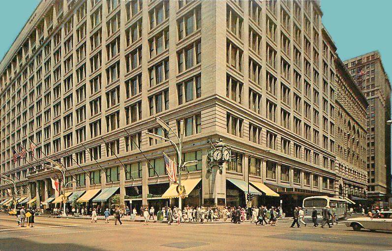 A POSTCARD - CHICAGO - MARSHALL FIELD'S - STATE AND WASHINGTON - THREE-QUARTERS VIEW GROUND LEVEL - AFTER STONE CLEANING - MID 1960s